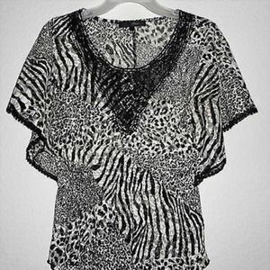 HEARTSOUL FABULOUS ANIMAL PRINT STRETCH BLOUSE